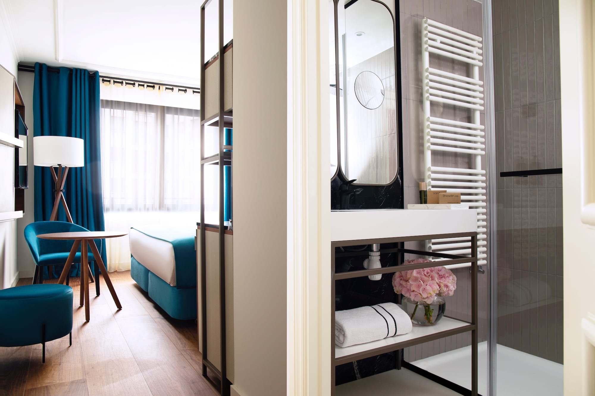 a bathroom with a mirror and a sink