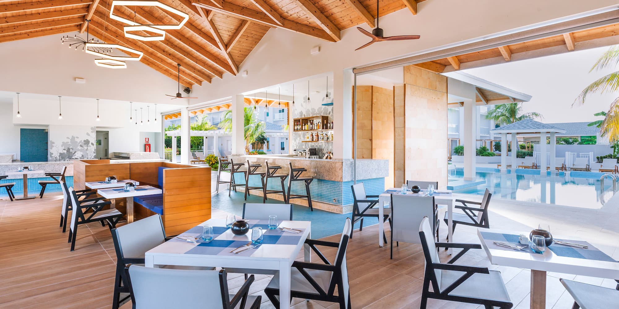 a restaurant with tables and chairs