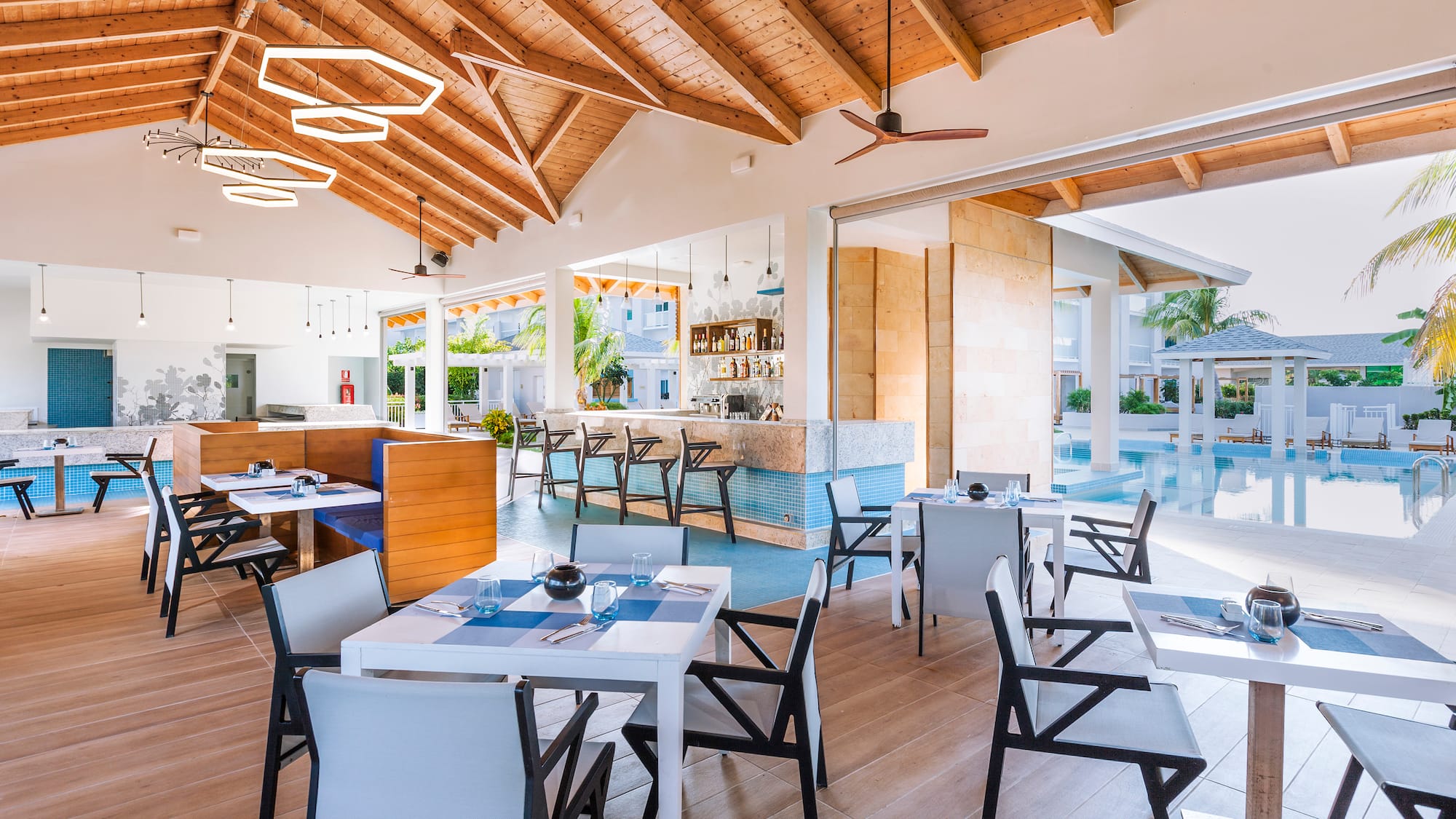 a restaurant with tables and chairs