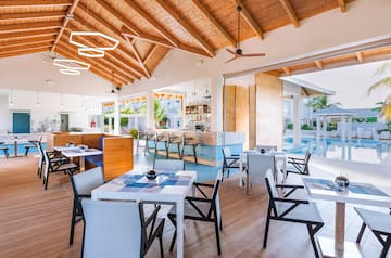 a room with tables and chairs