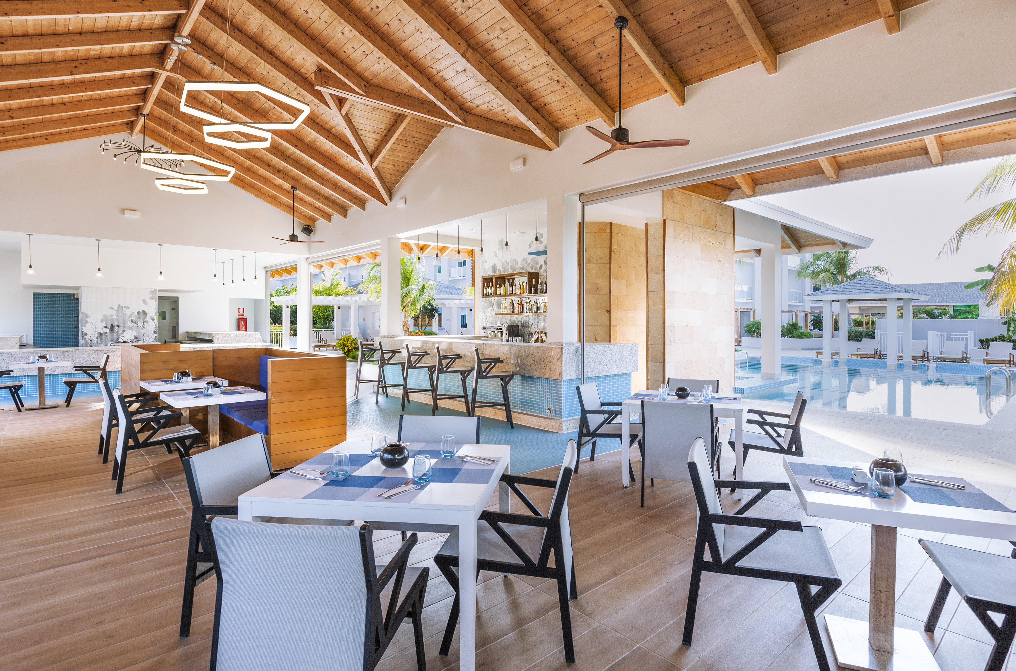 a restaurant with tables and chairs