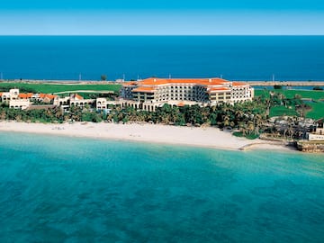 a large building on a beach