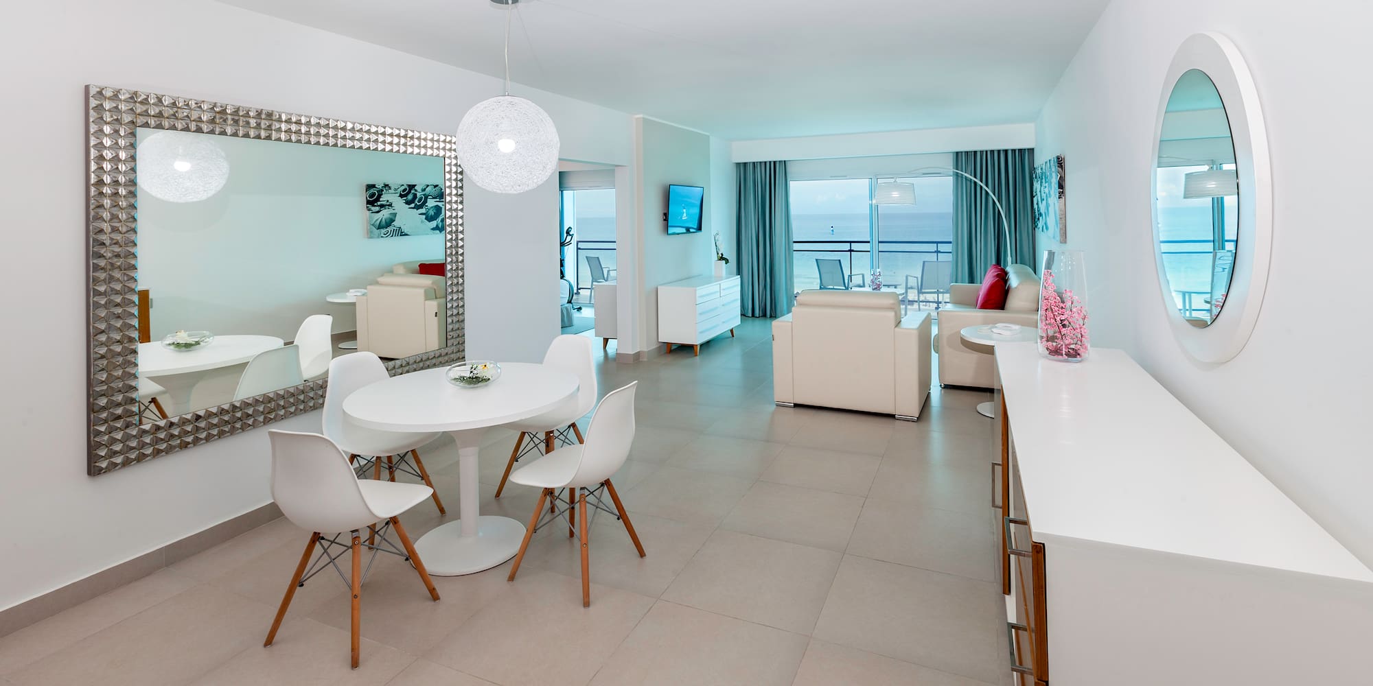 a room with a table and chairs