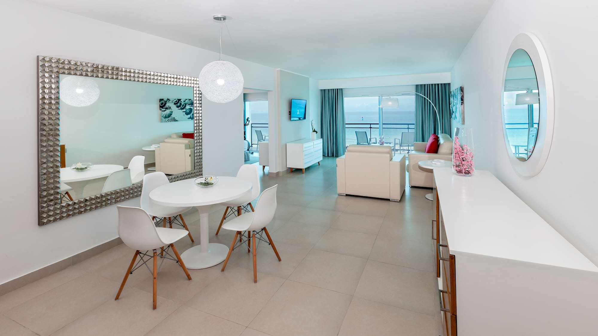 a room with a table and chairs