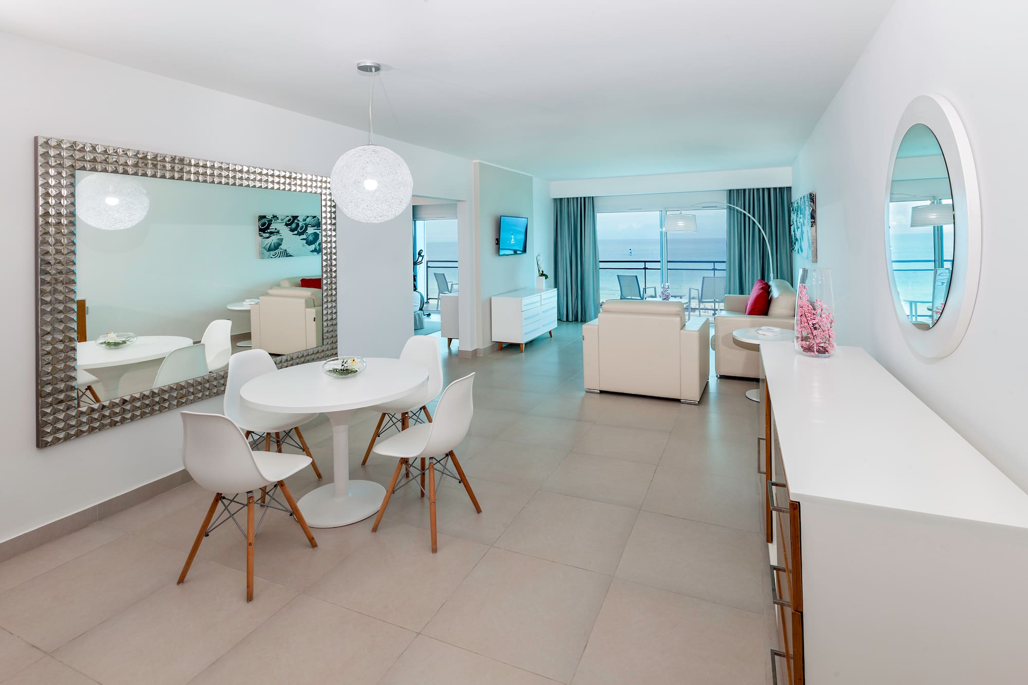 a room with a table and chairs