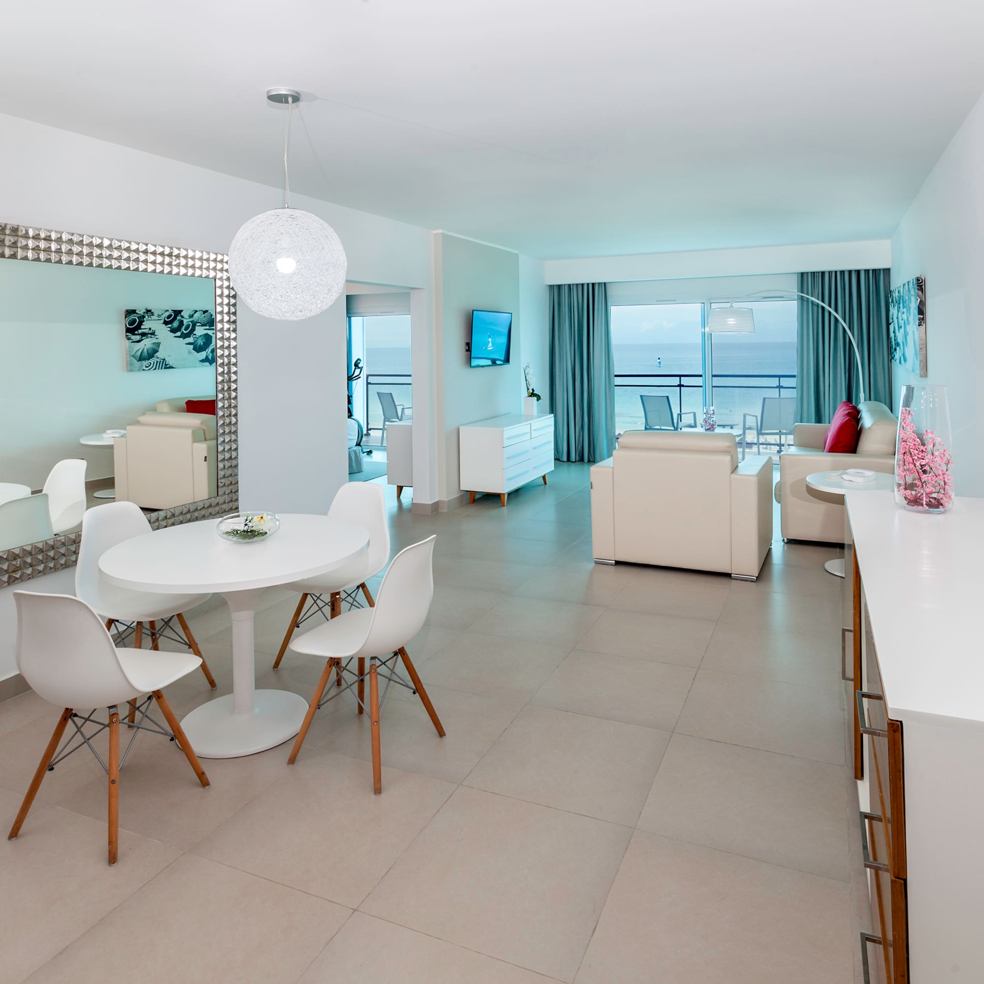 a room with a table and chairs