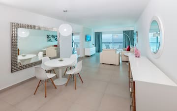 a room with a table and chairs