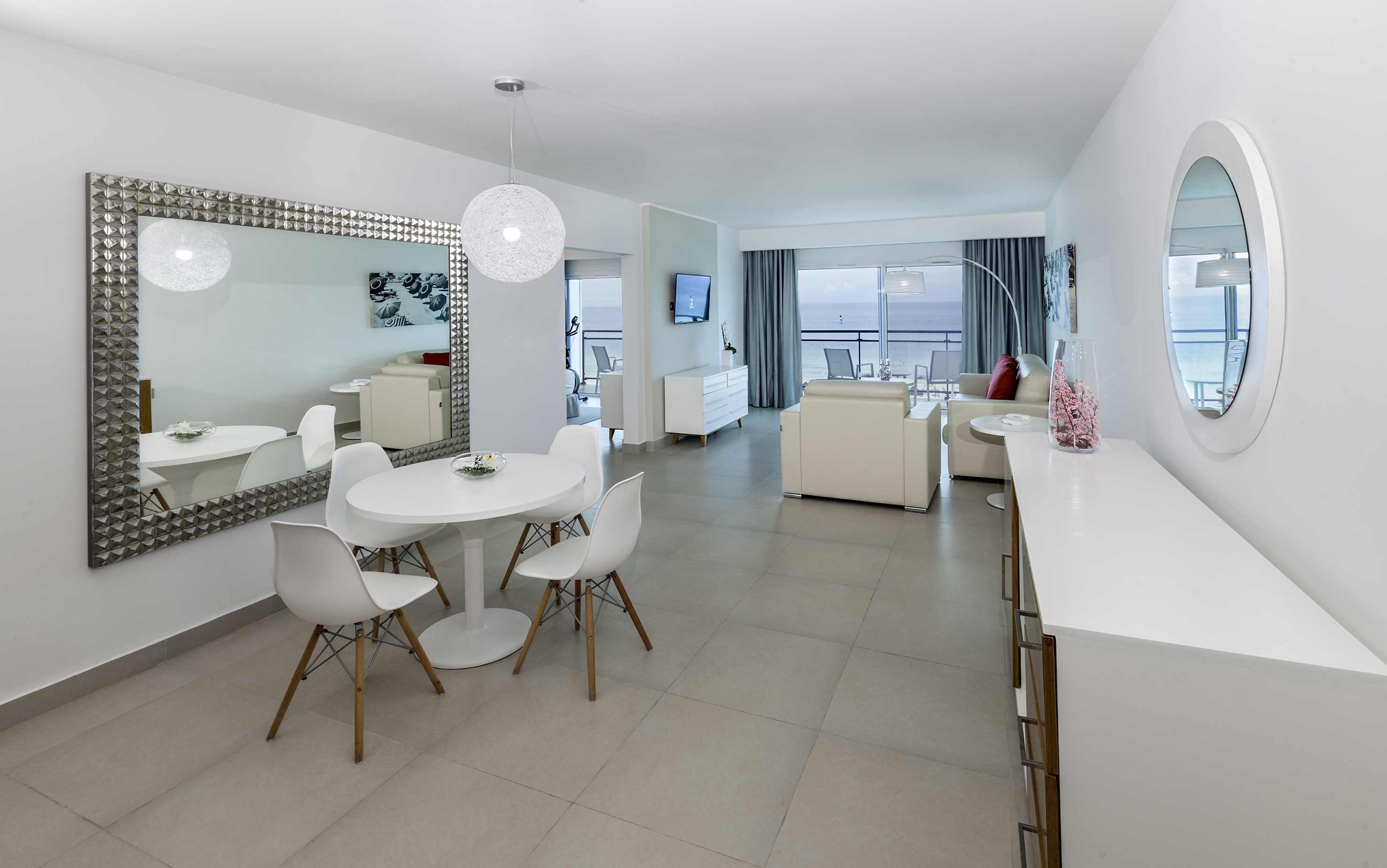 a room with a table and chairs