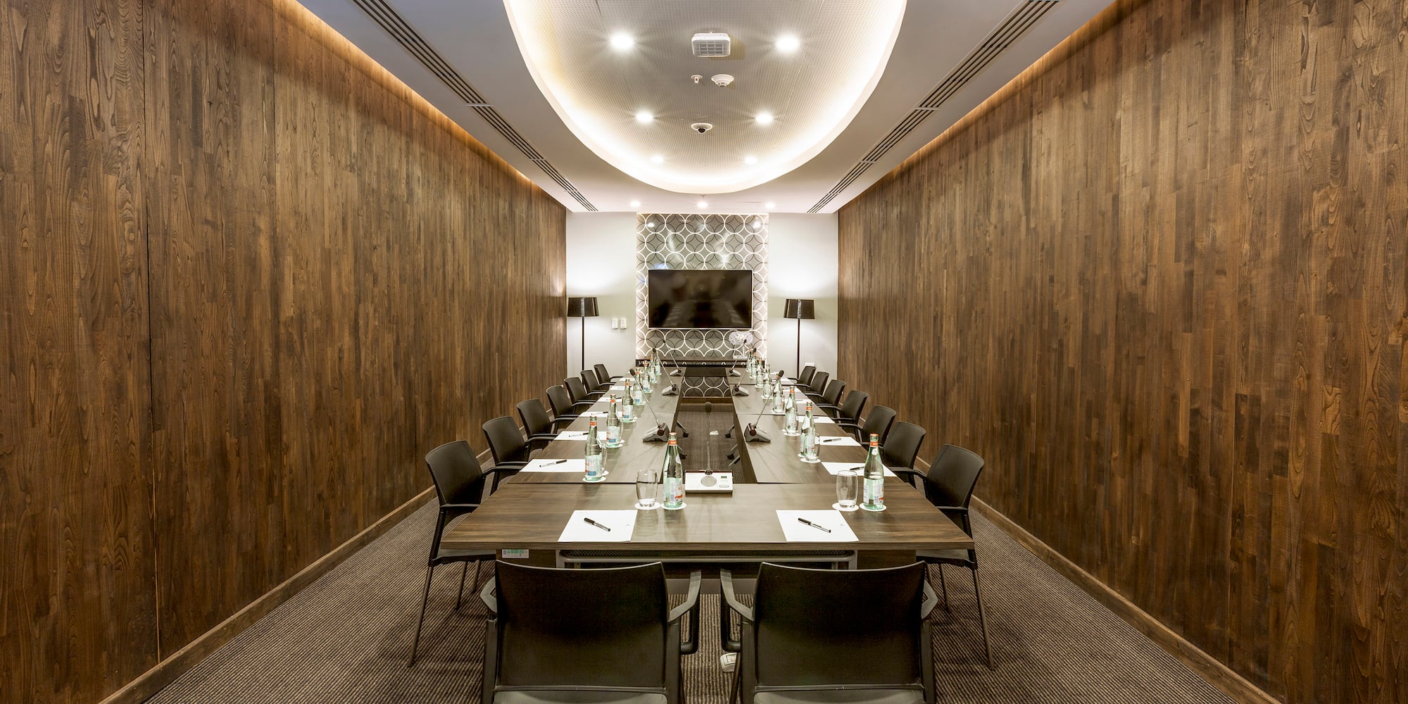 a room with a table and chairs