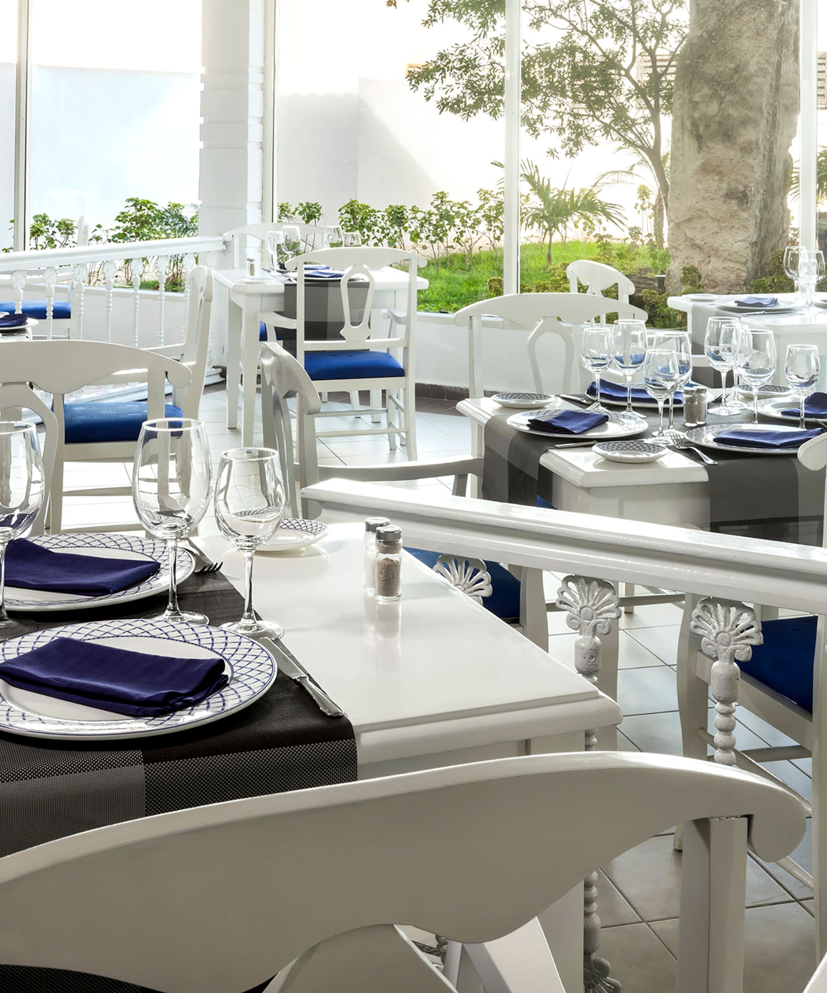 a restaurant with tables and chairs