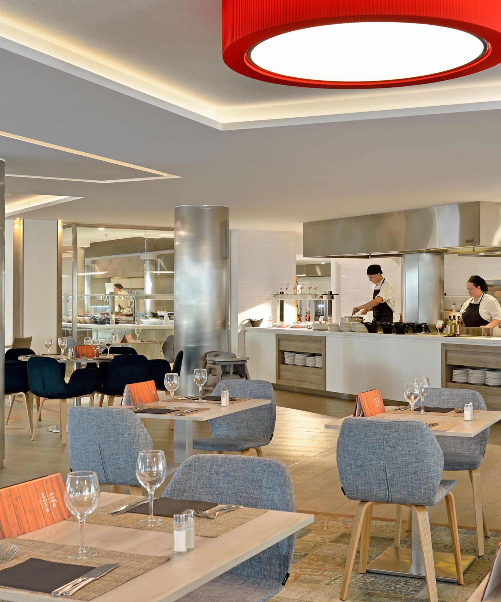 a restaurant with tables and chairs