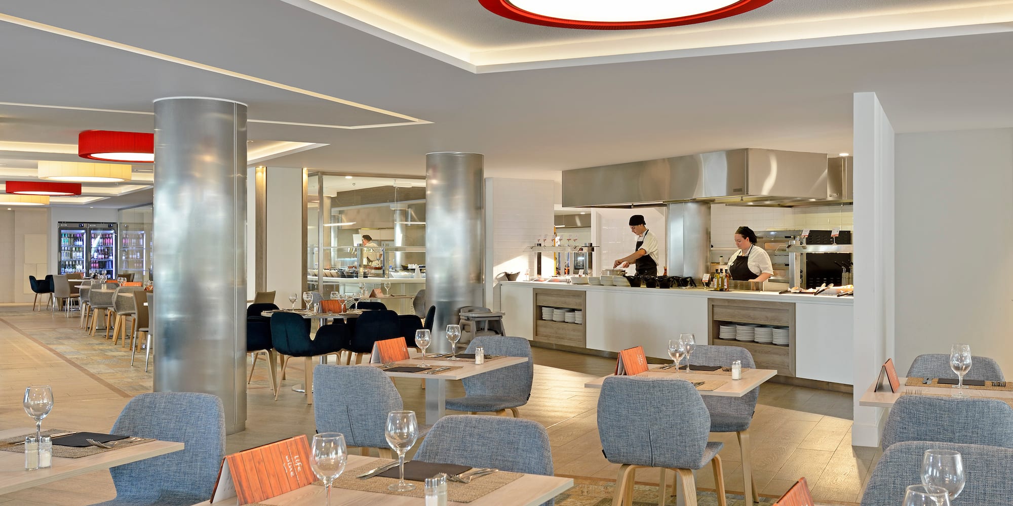 a restaurant with tables and chairs