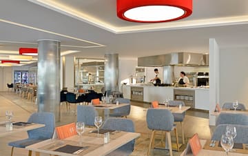 a restaurant with tables and chairs