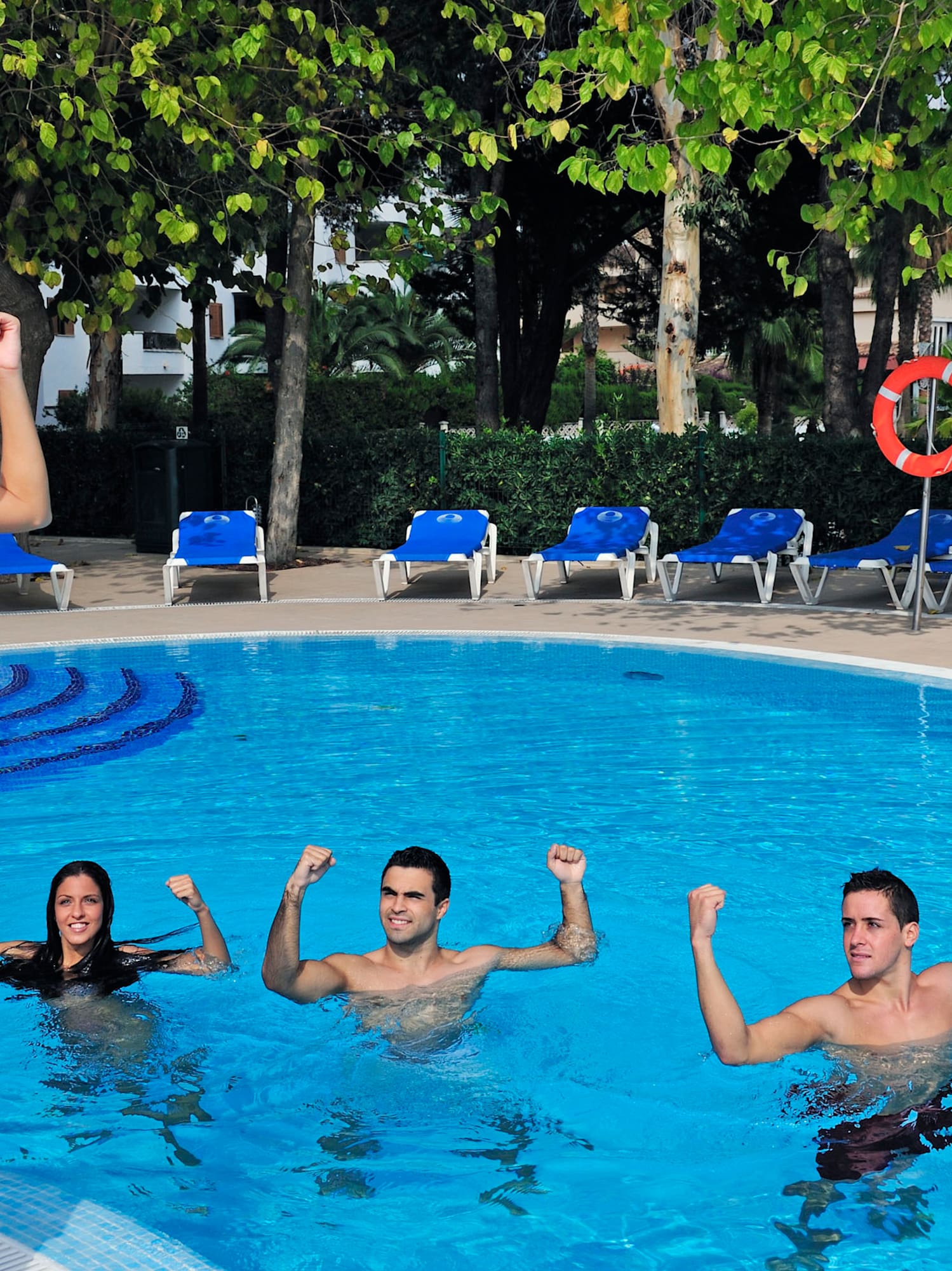 a group of people in a pool