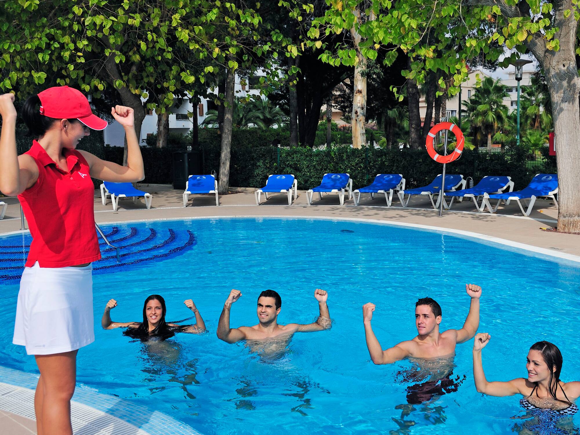 a group of people in a pool