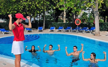 a group of people in a pool
