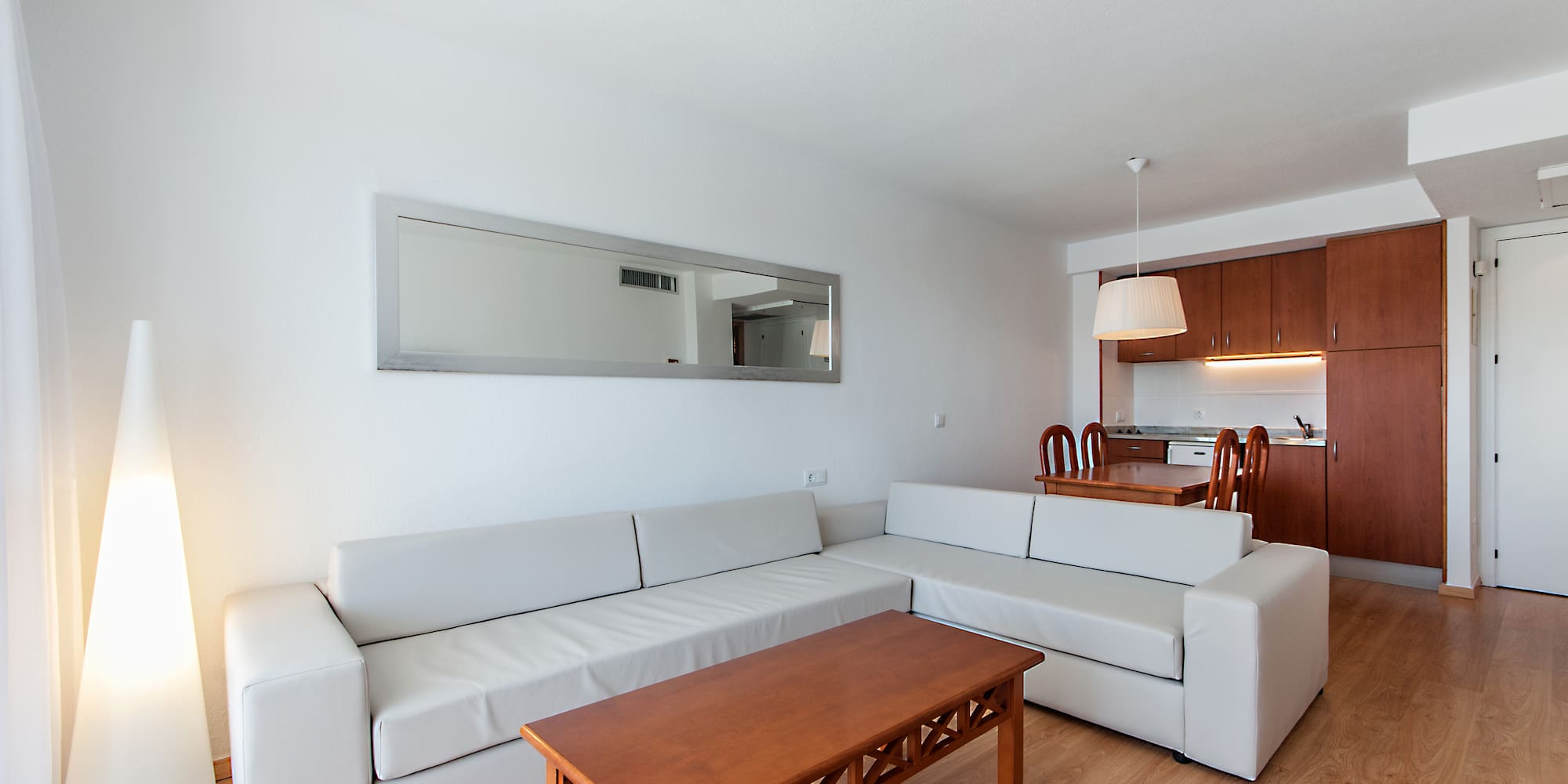 a living room with a couch and a table