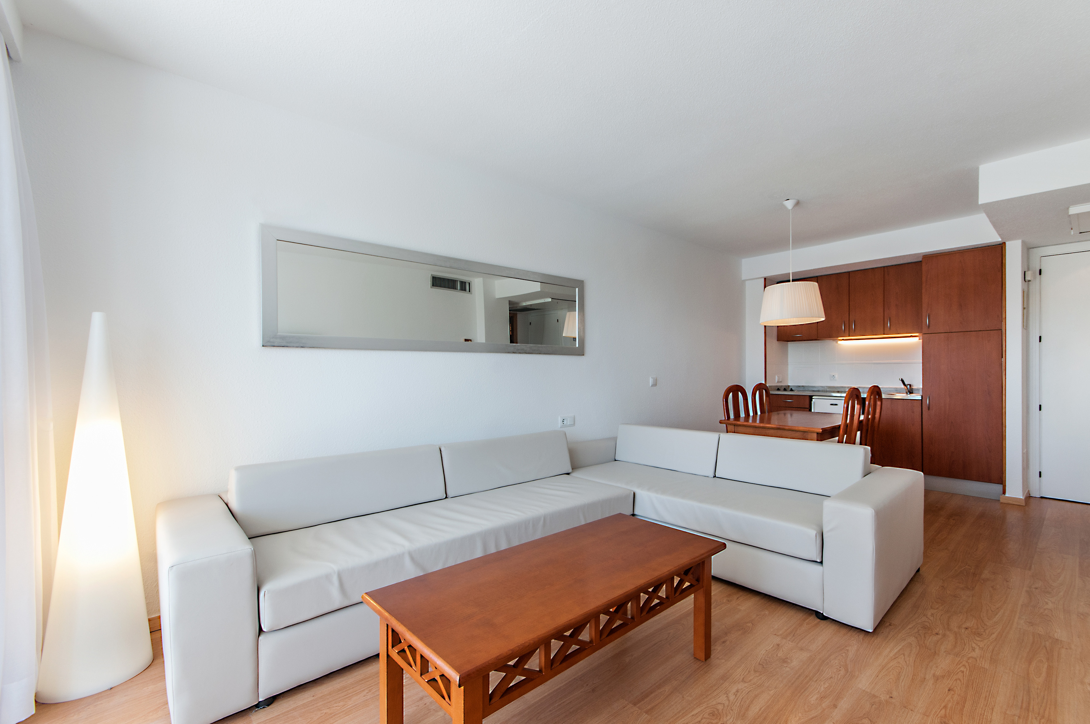 a living room with a couch and a table