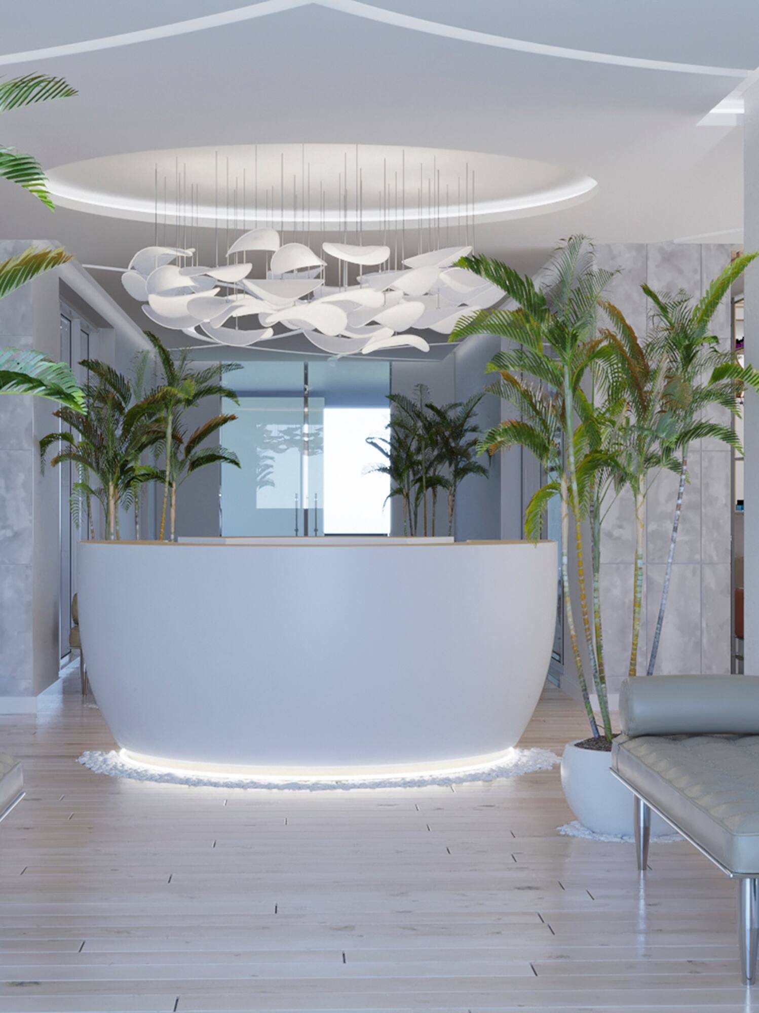 a lobby with a reception desk and palm trees