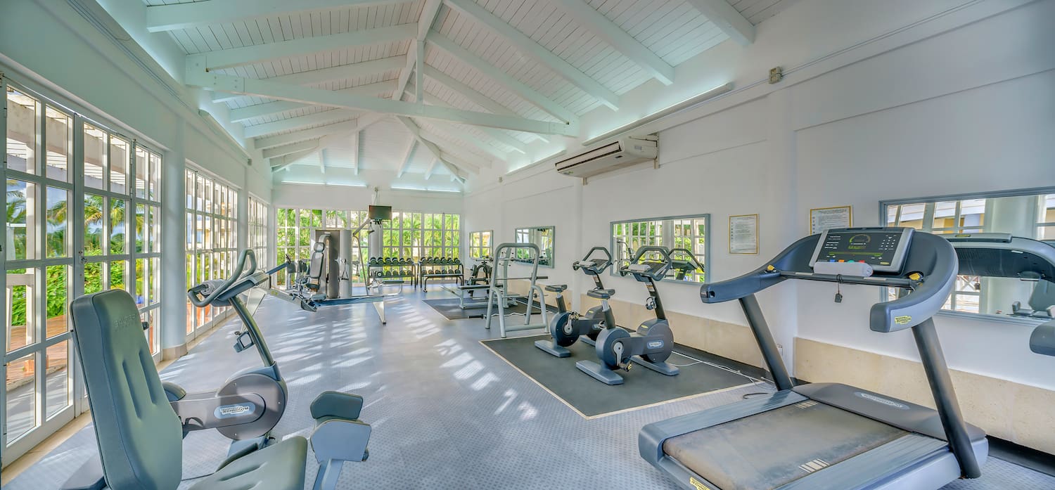 a large room with exercise equipment