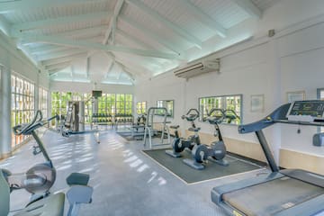 a large room with exercise equipment