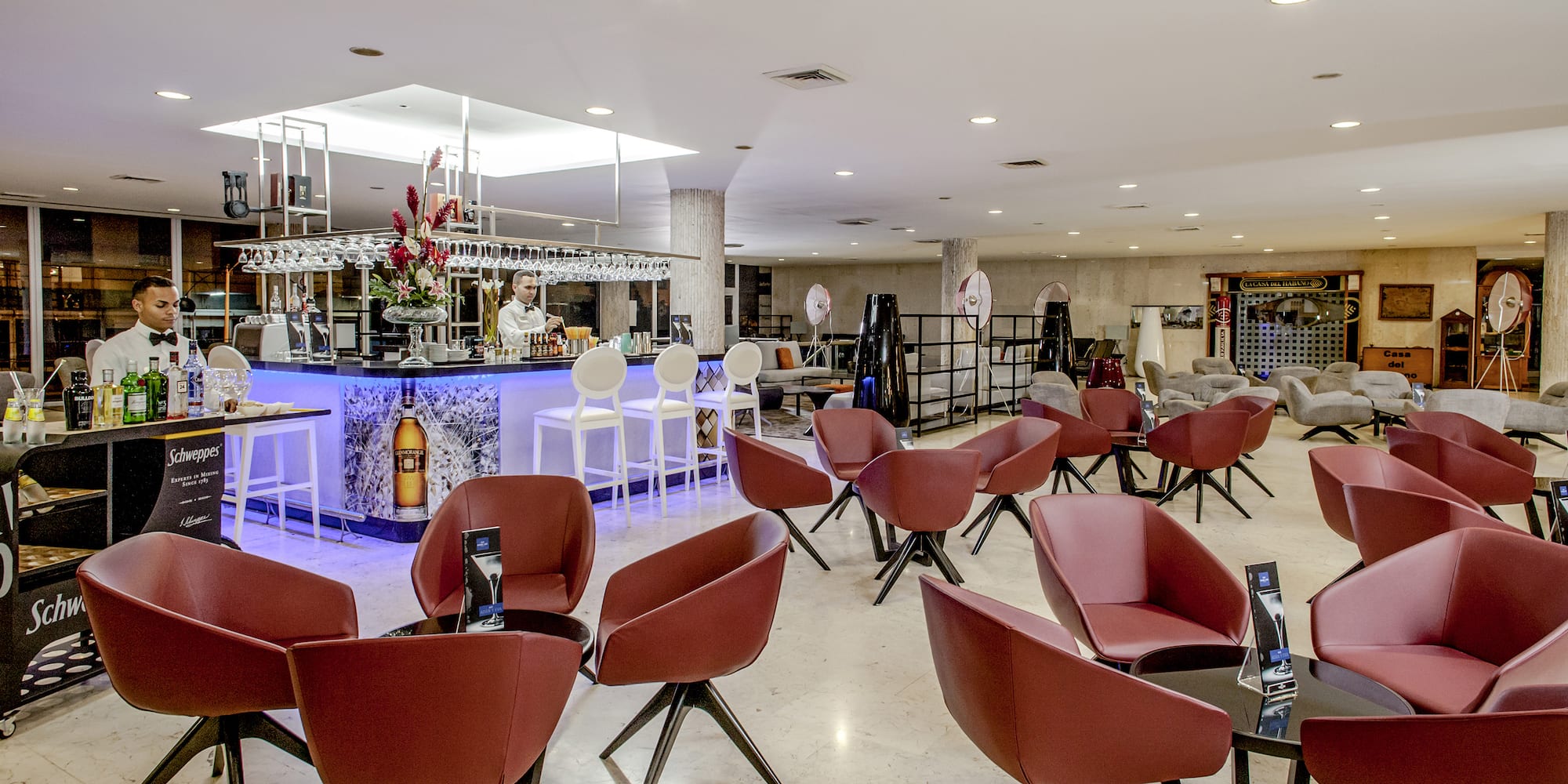 a room with chairs and tables