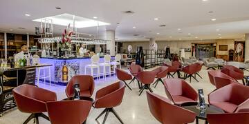 a room with chairs and tables