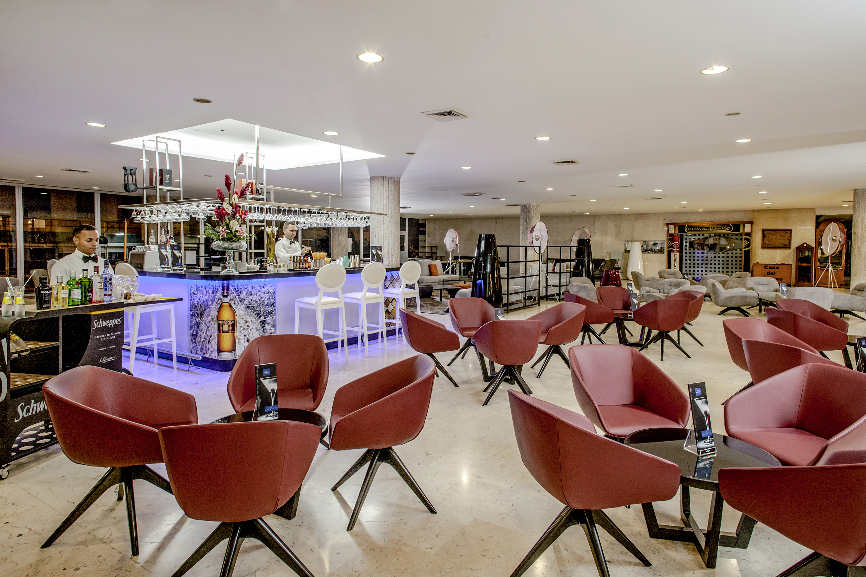 a room with chairs and tables