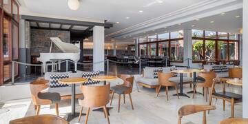 a room with tables and chairs