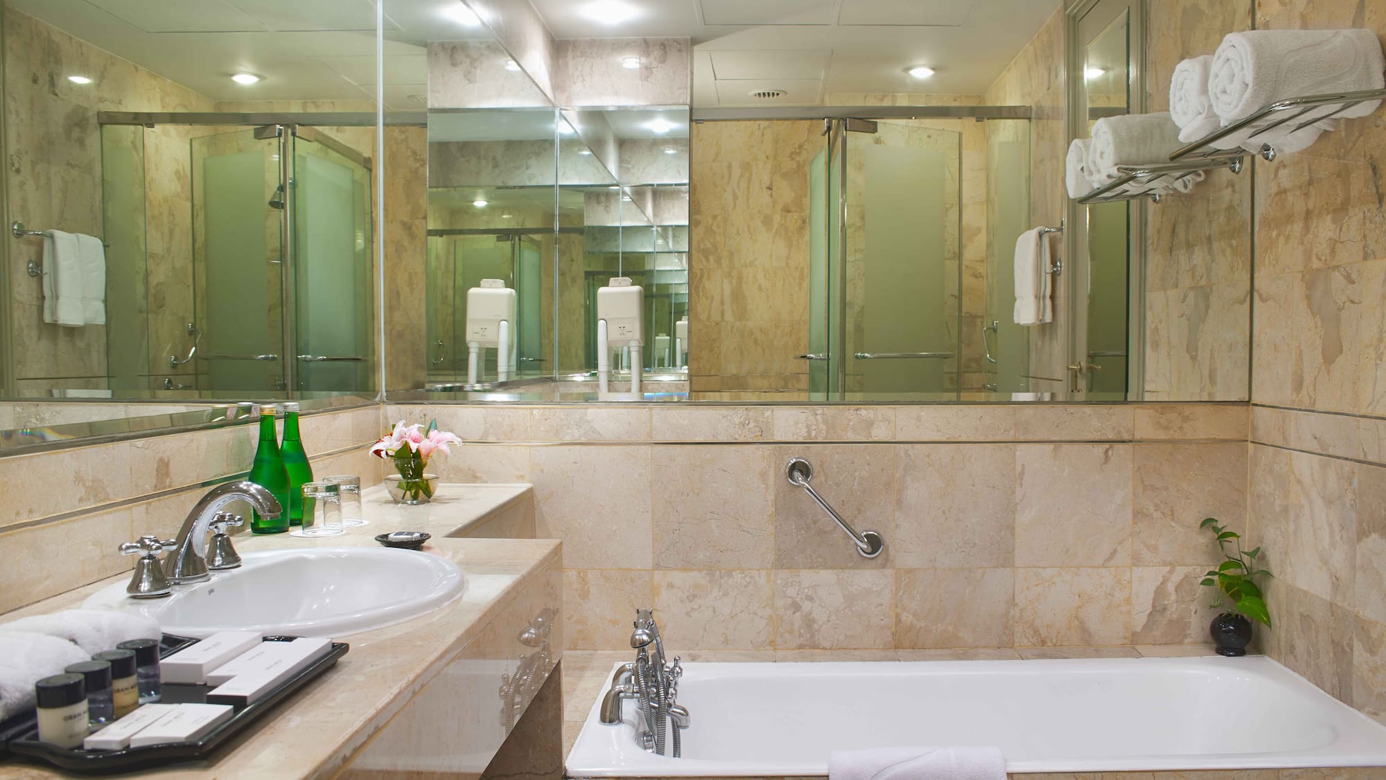 a bathroom with a bathtub and a mirror