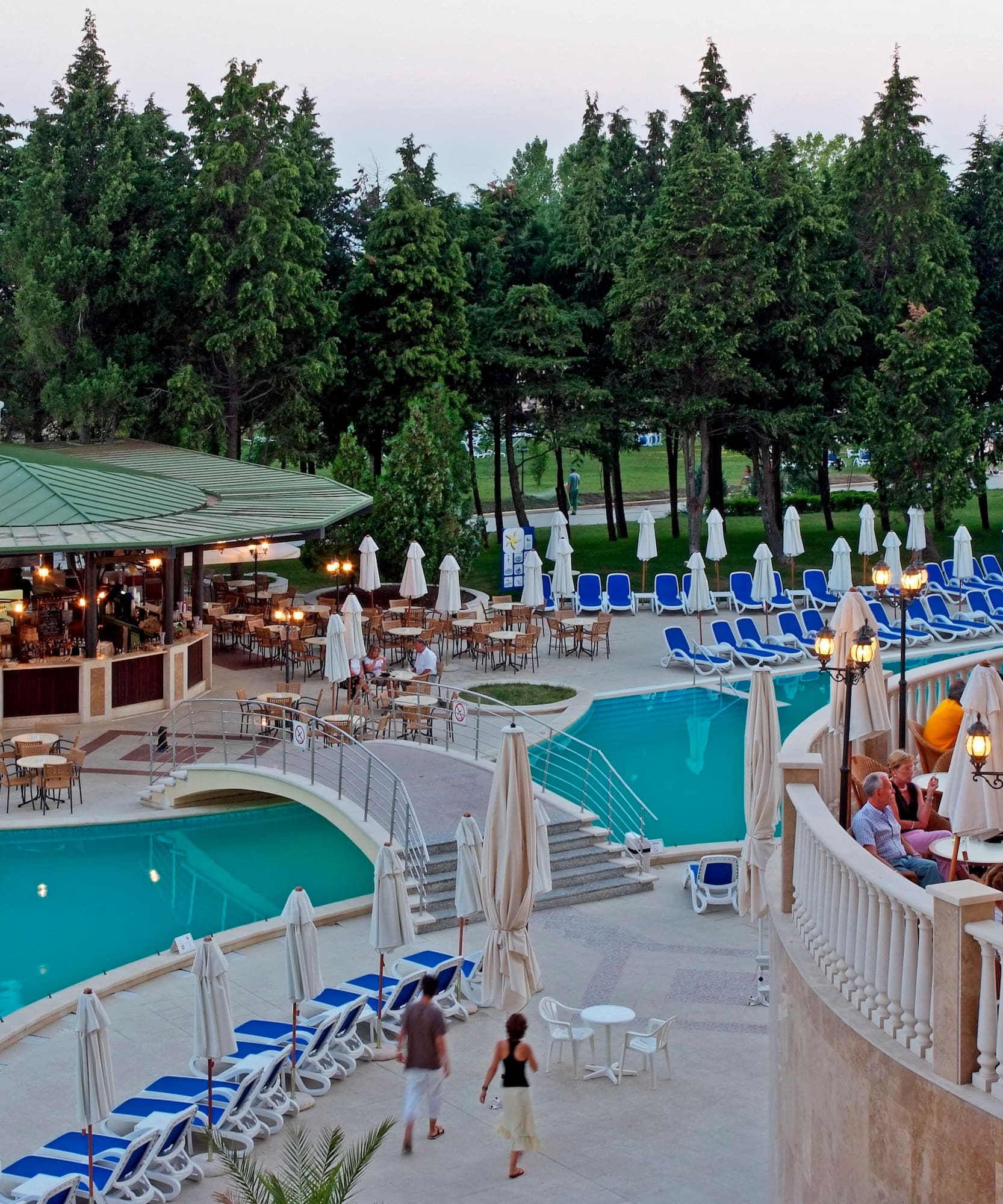 a pool with people sitting on it