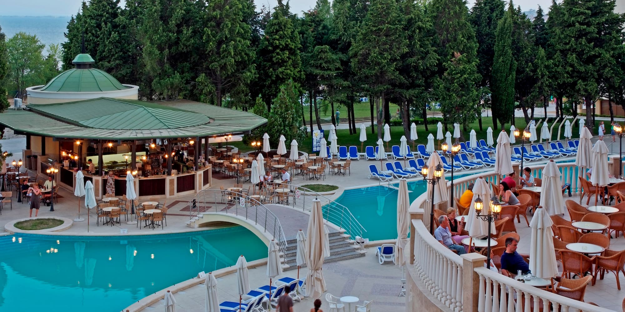 a pool with people sitting on it