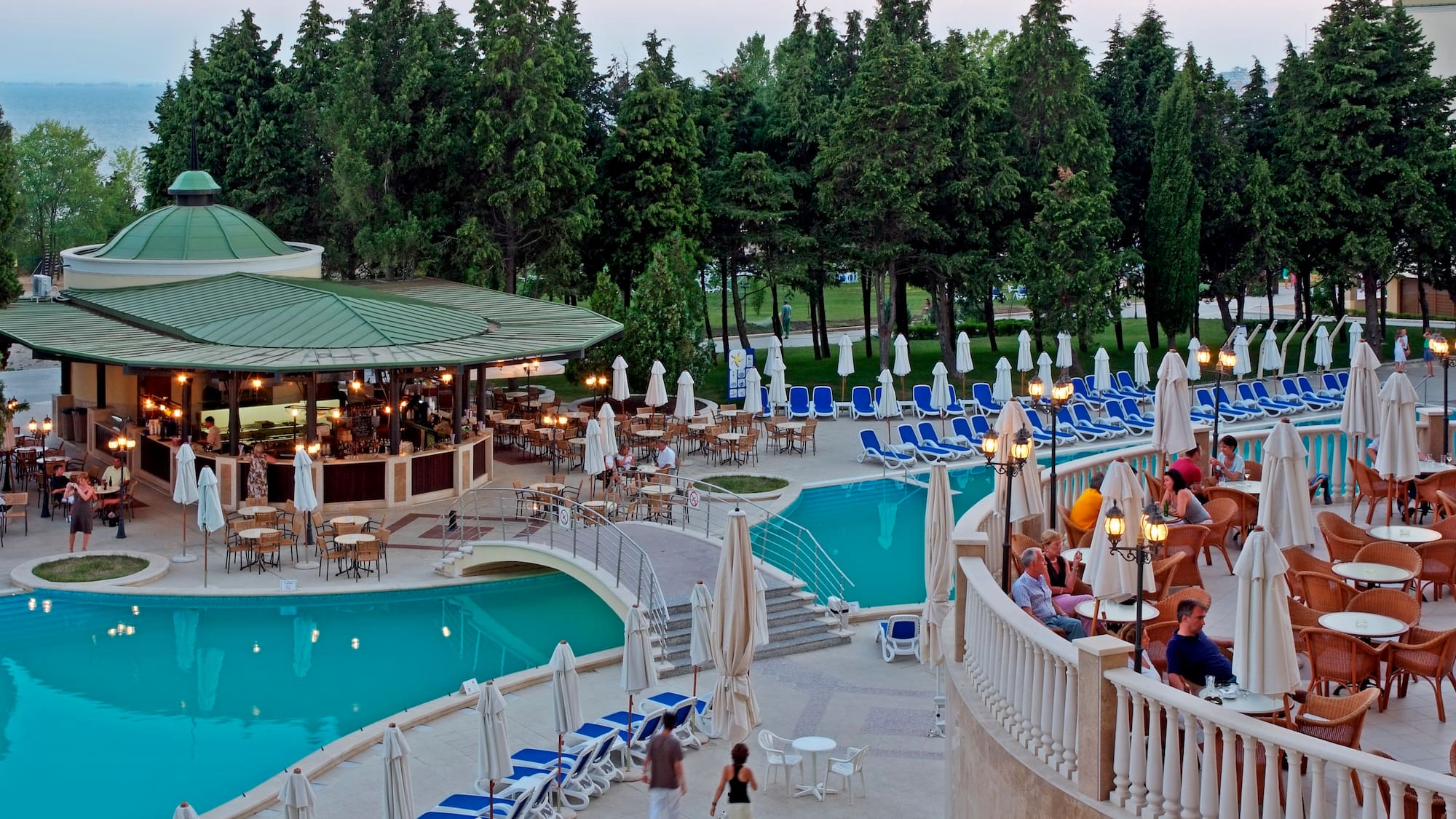 a pool with people sitting on it