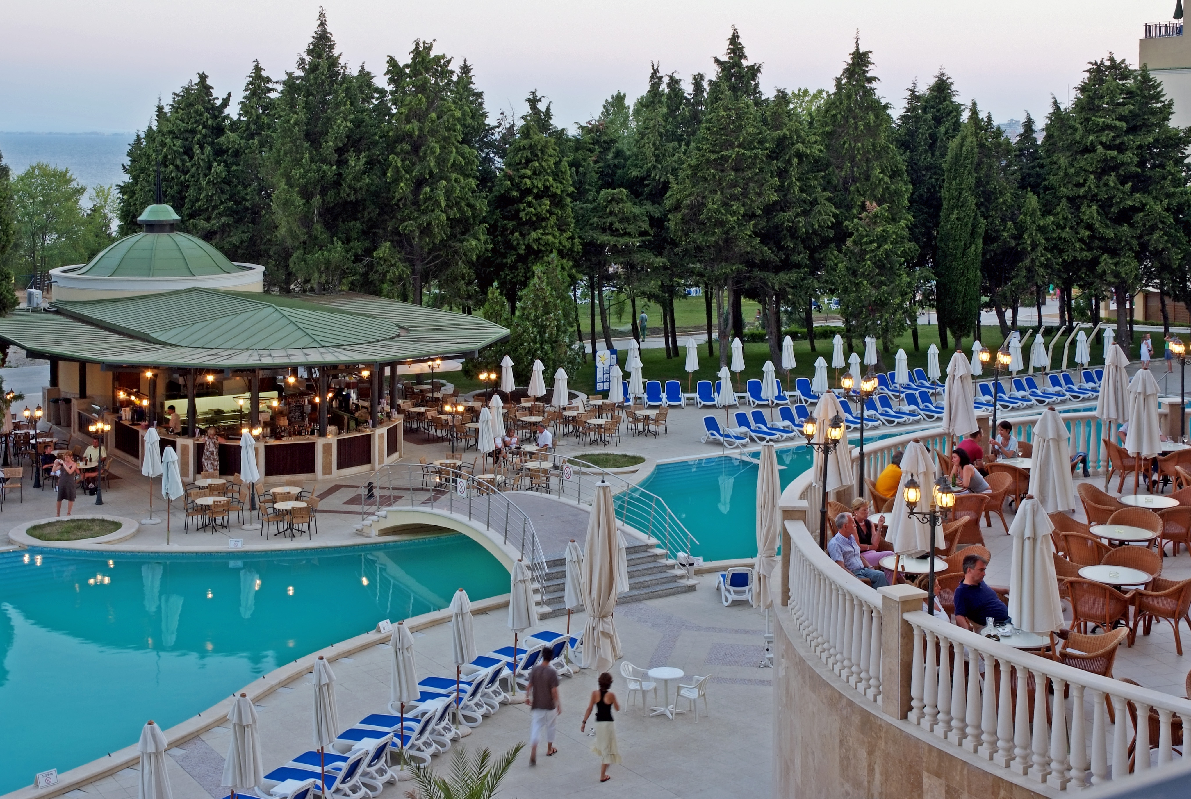 a pool with people sitting on it