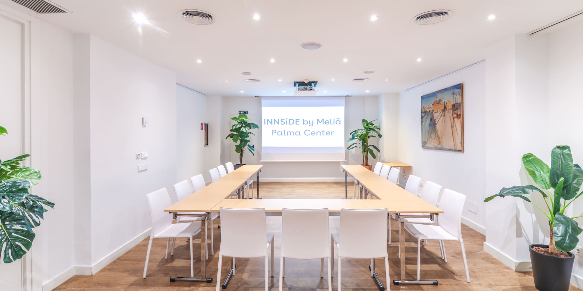 a room with a table and chairs