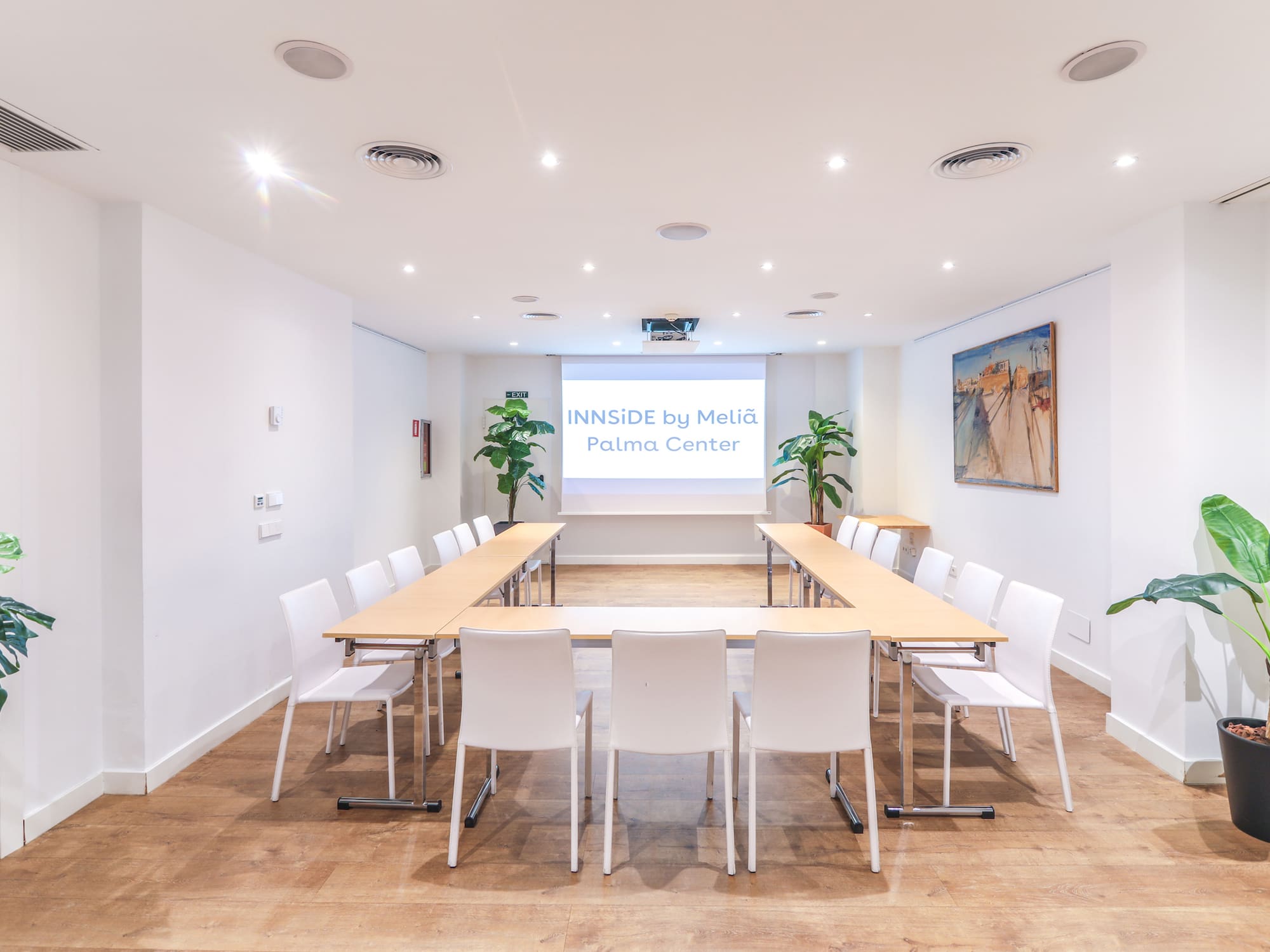 a room with a table and chairs