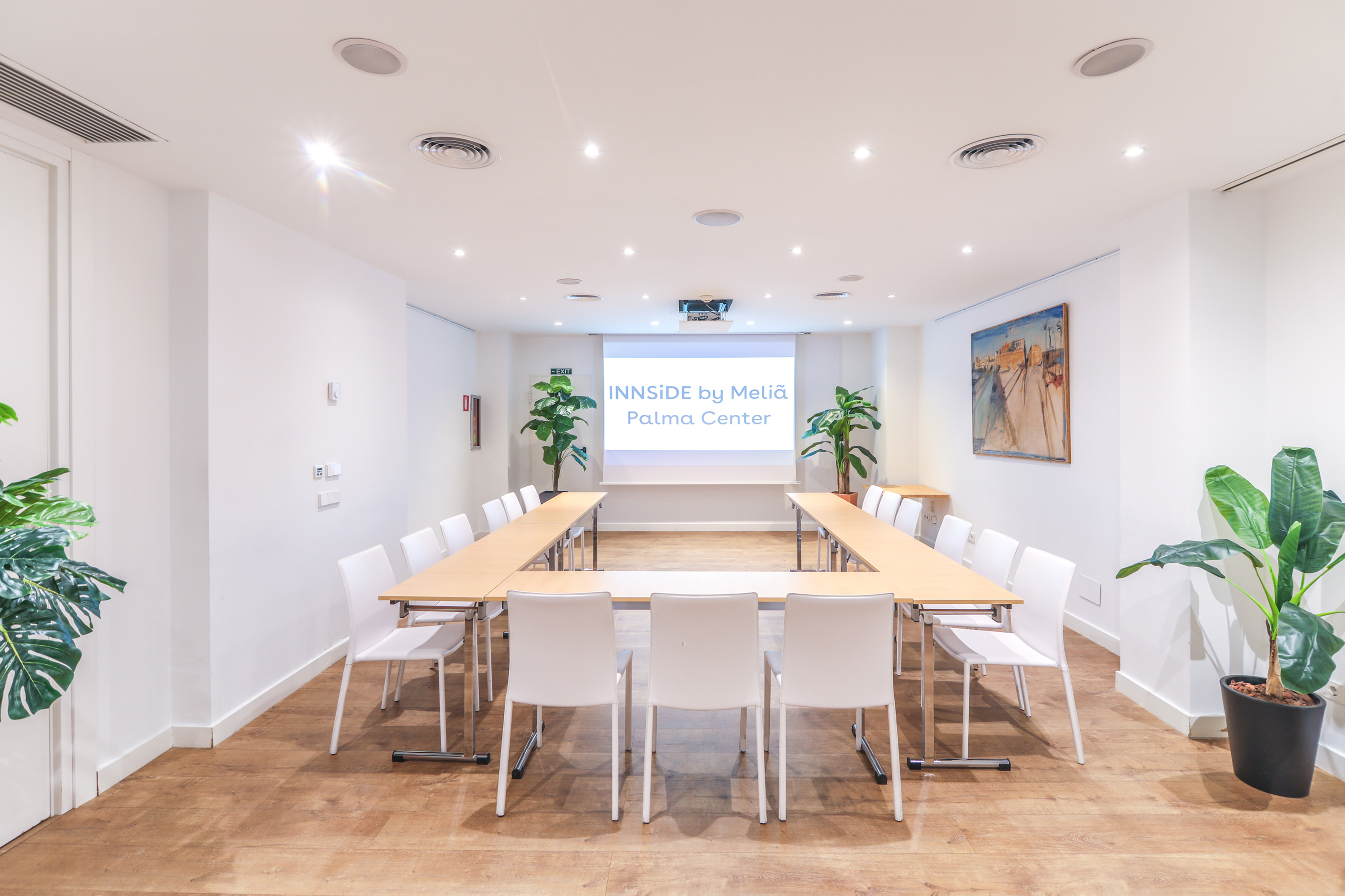a room with a table and chairs