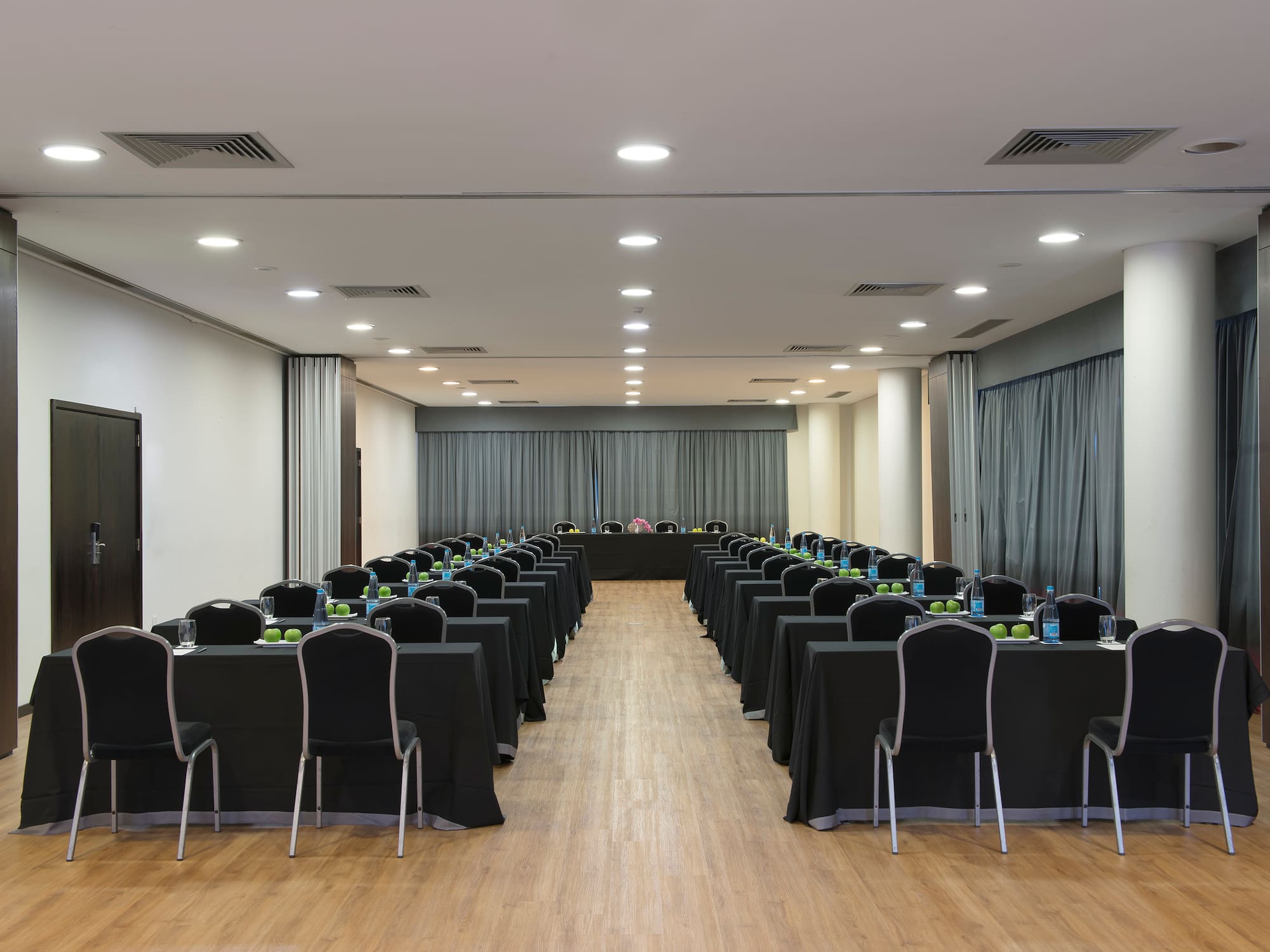 a room with tables and chairs