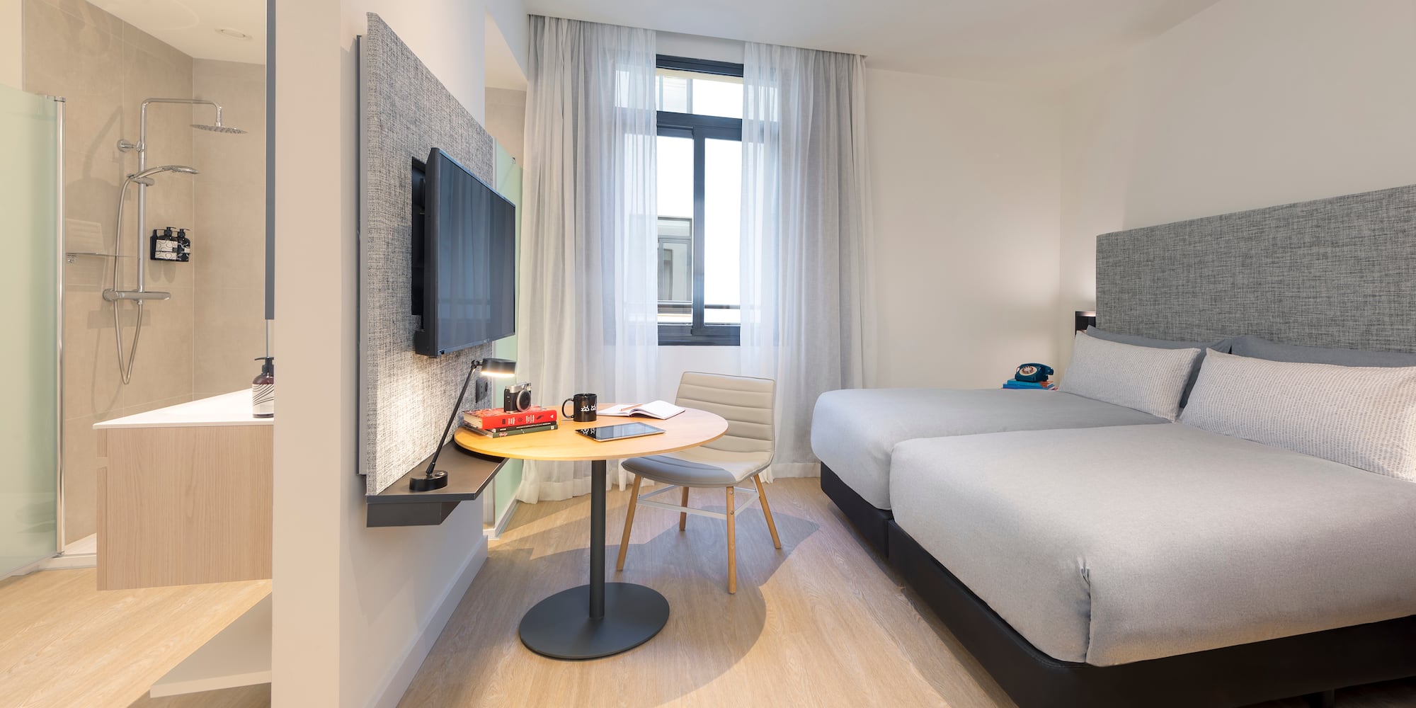 a room with a bed and a table