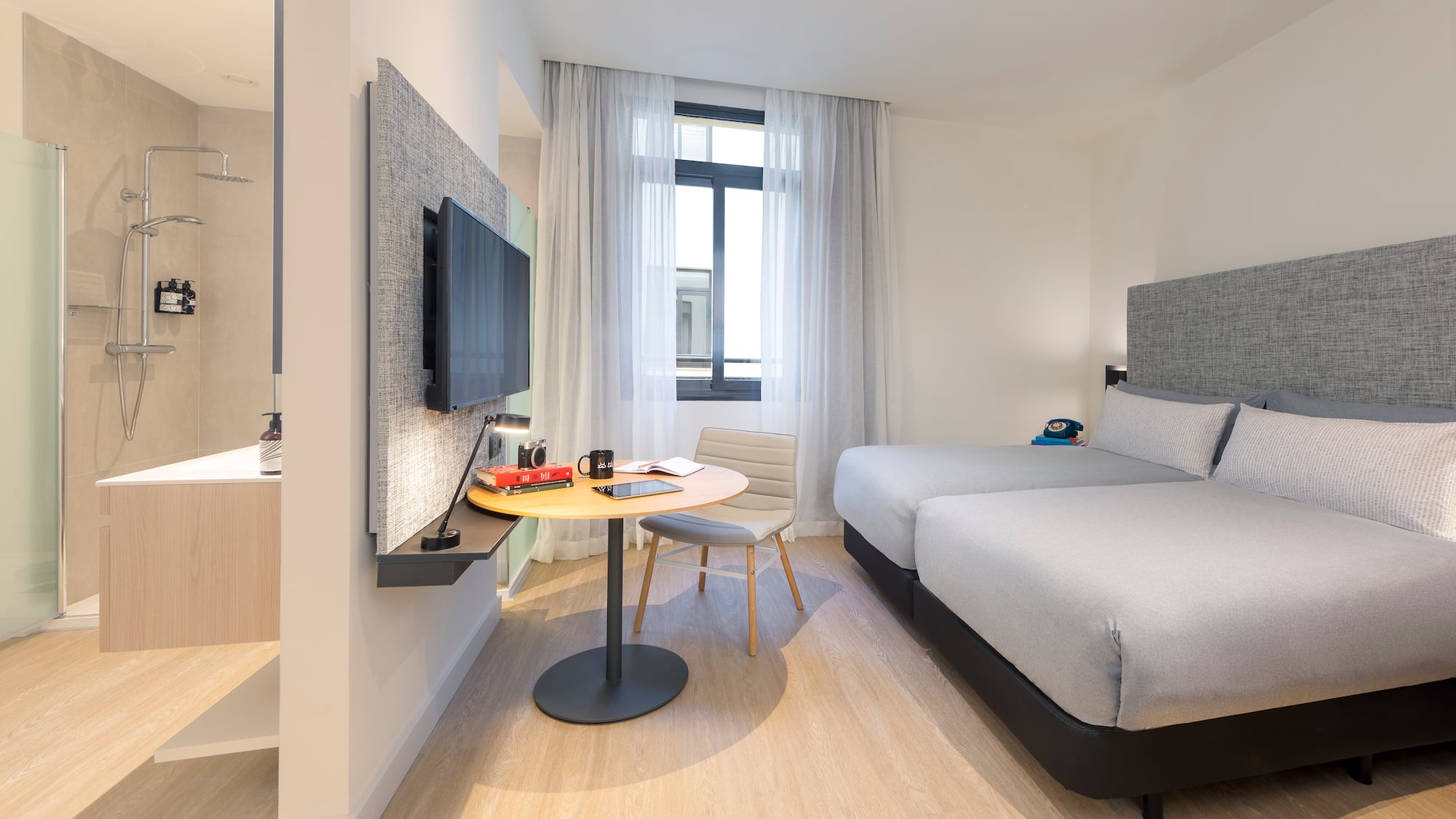 a room with a bed and a table