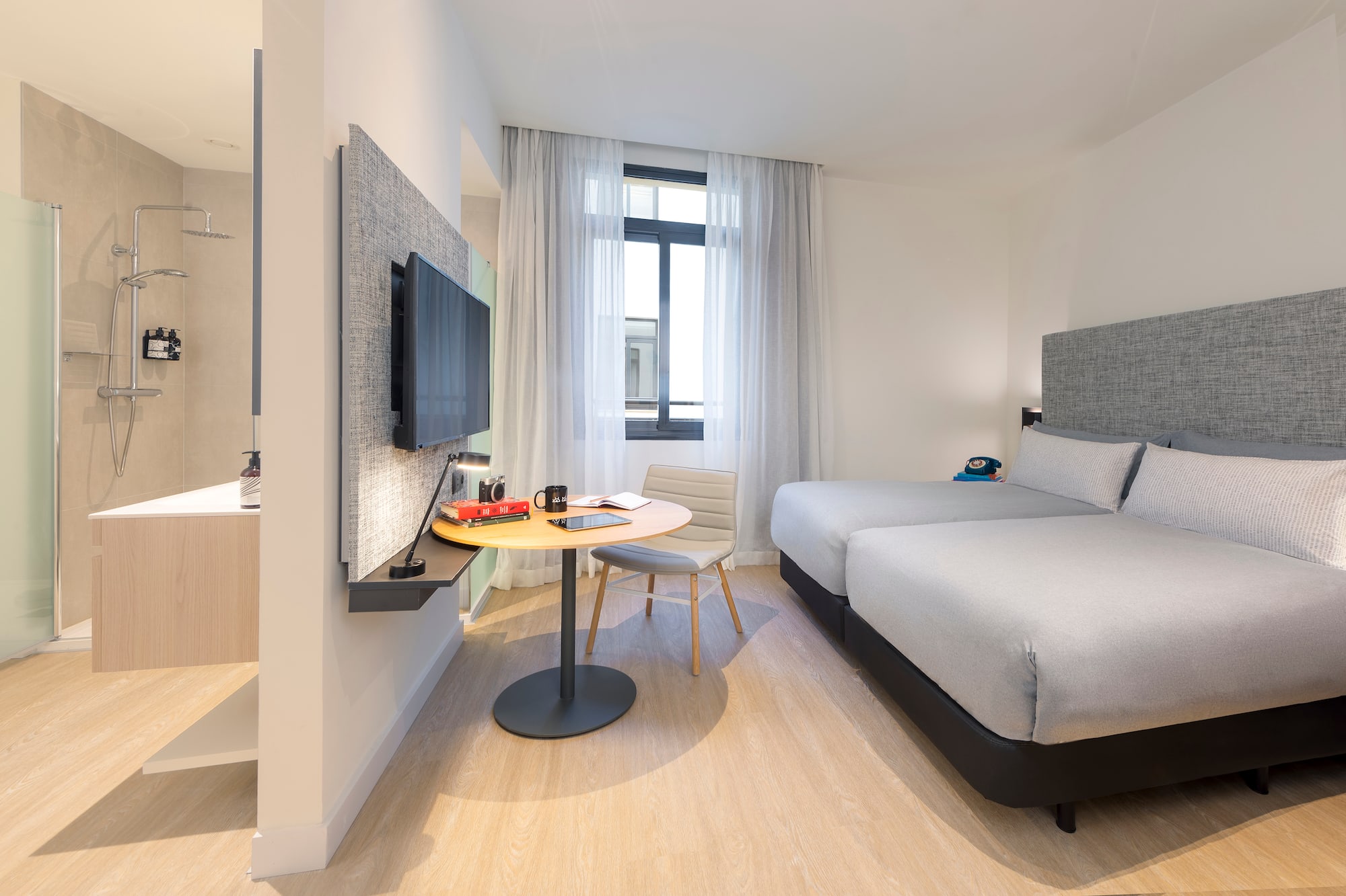 a room with a bed and a table