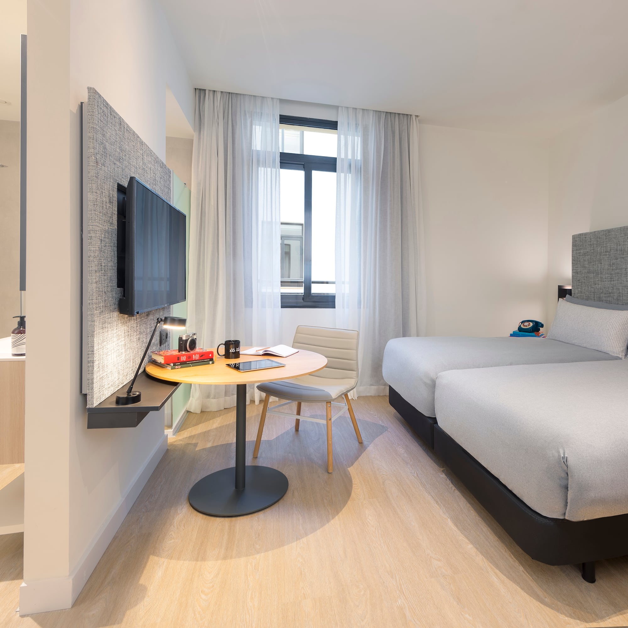 a room with a bed and a table