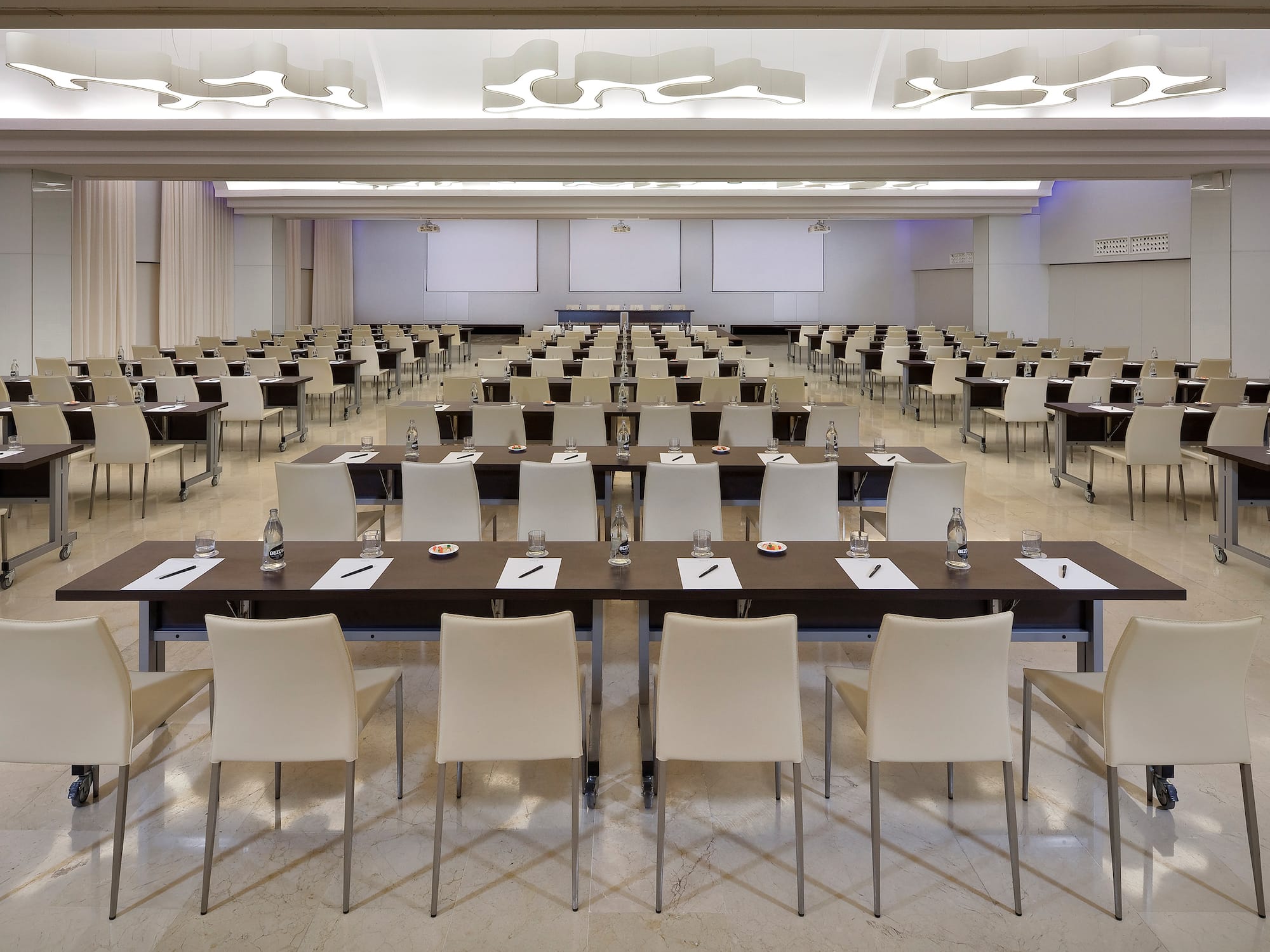 a room with tables and chairs