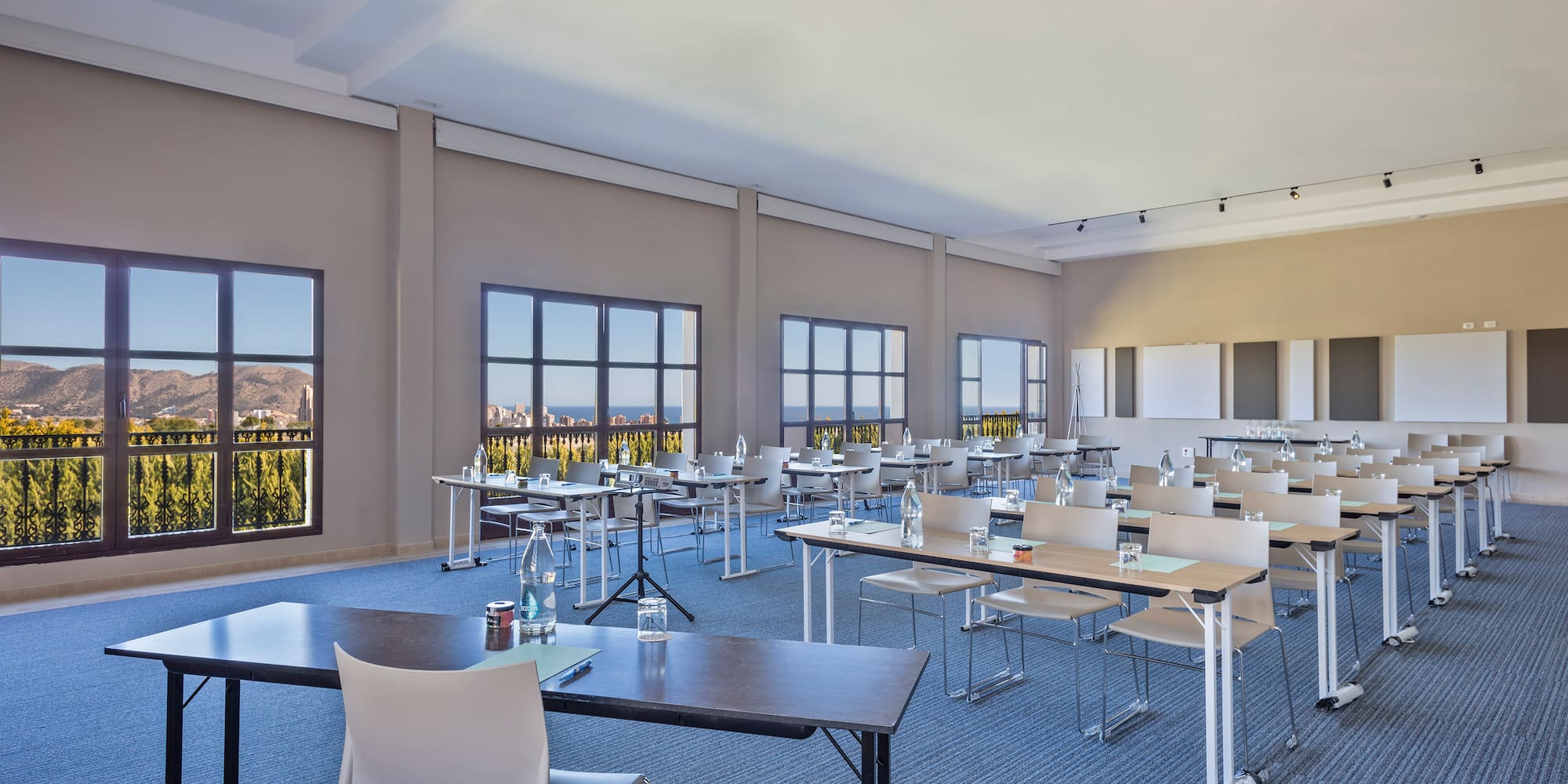 a room with tables and chairs