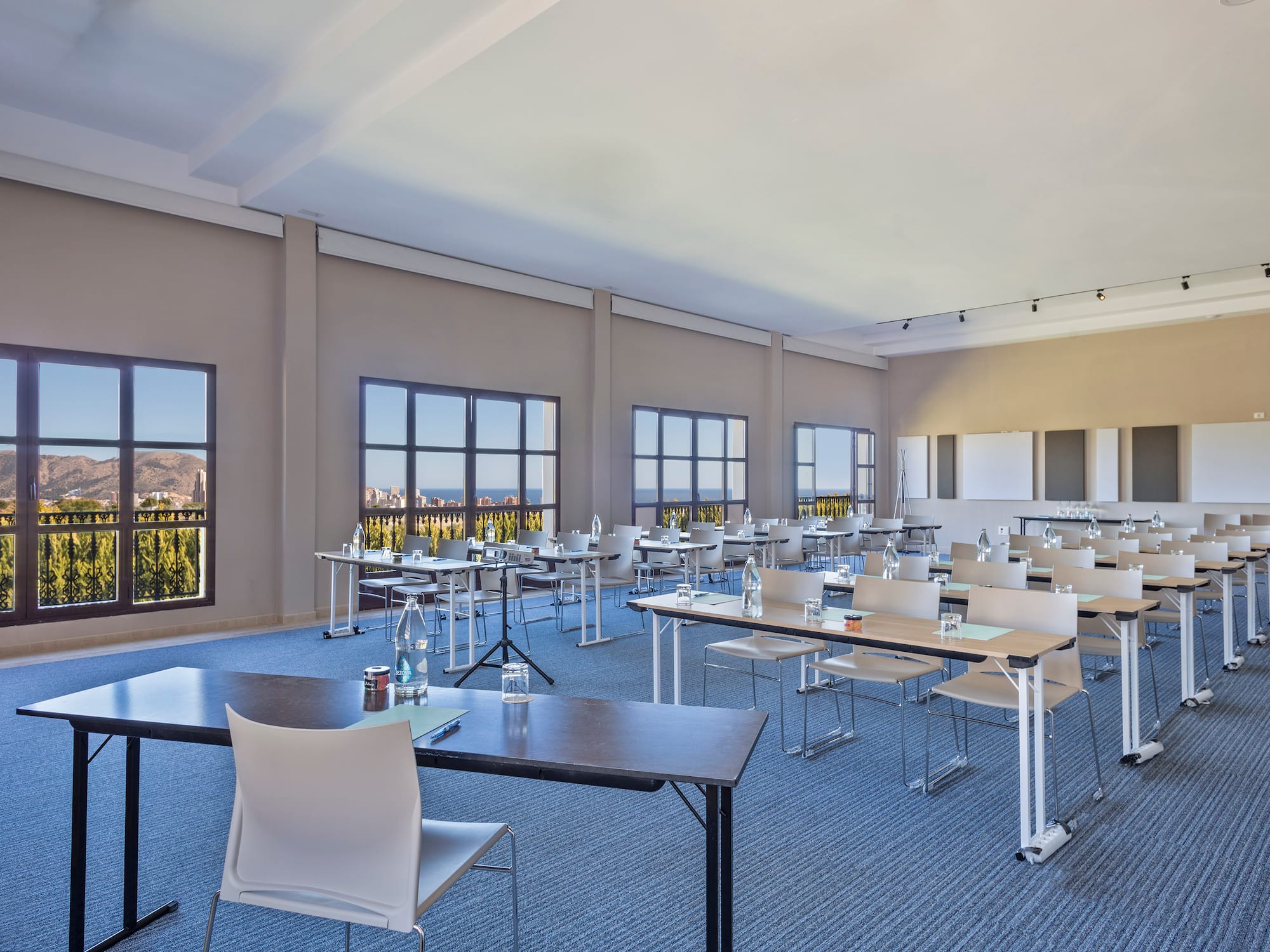 a room with tables and chairs