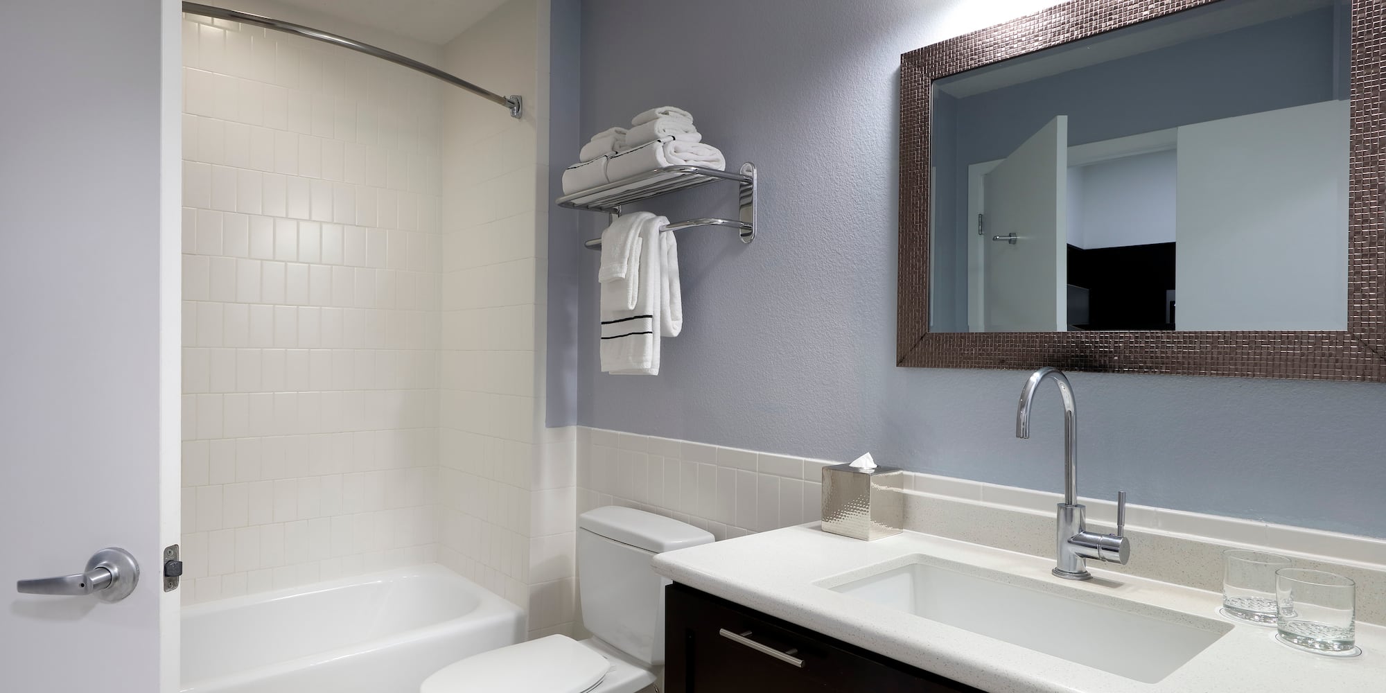 a bathroom with a sink toilet and bathtub