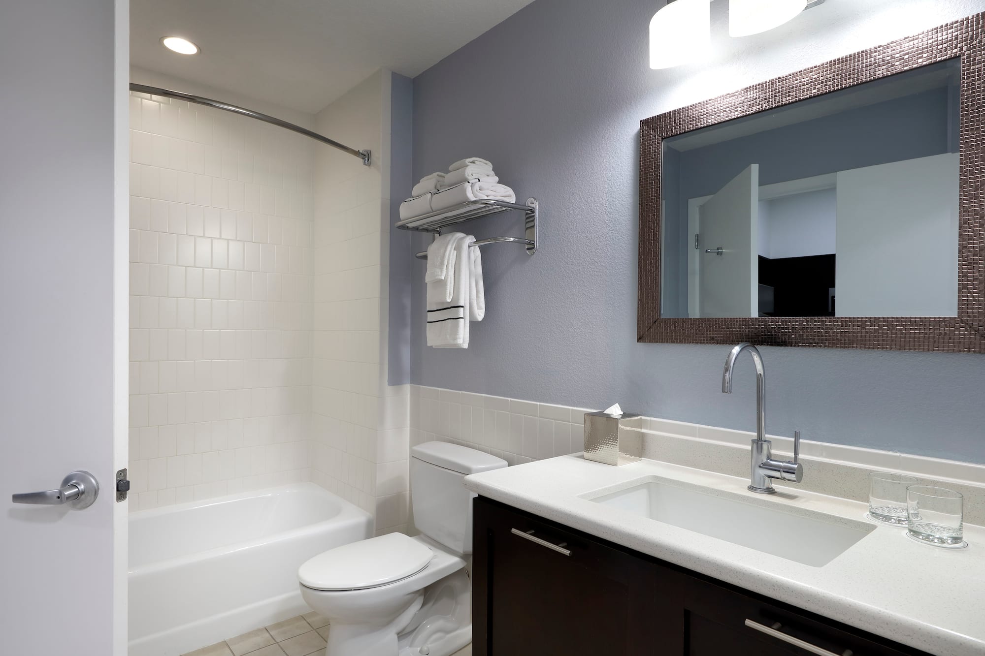 a bathroom with a sink toilet and bathtub