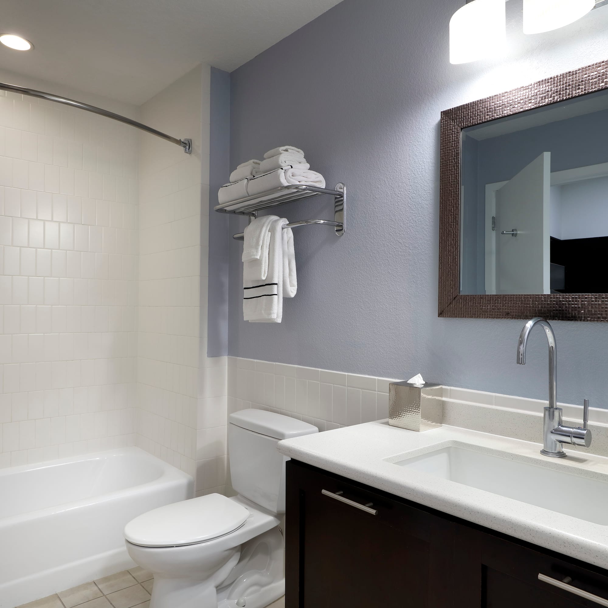 a bathroom with a sink toilet and bathtub