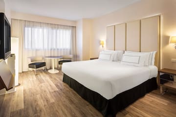 a room with a bed and a table