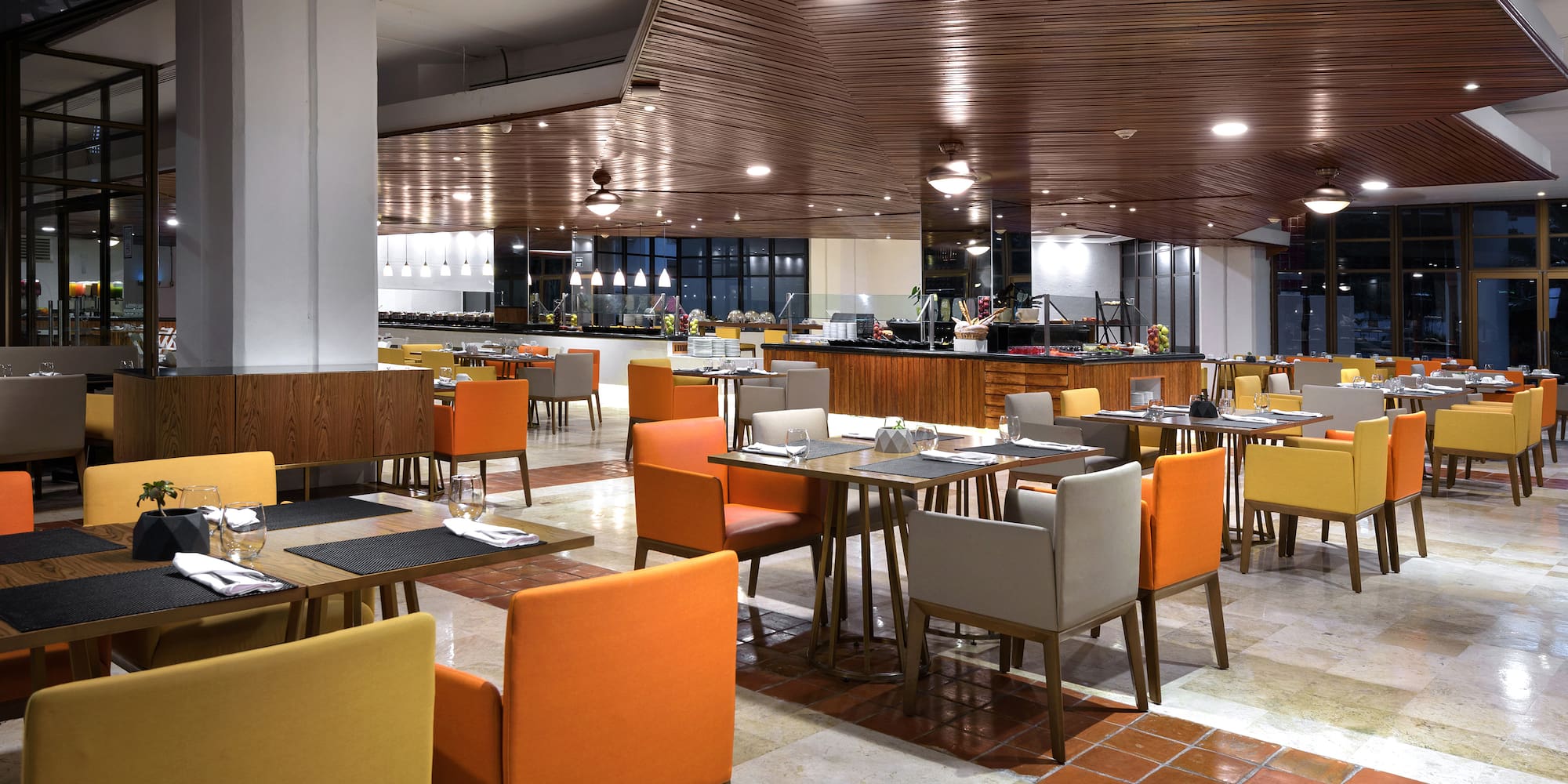 a restaurant with tables and chairs